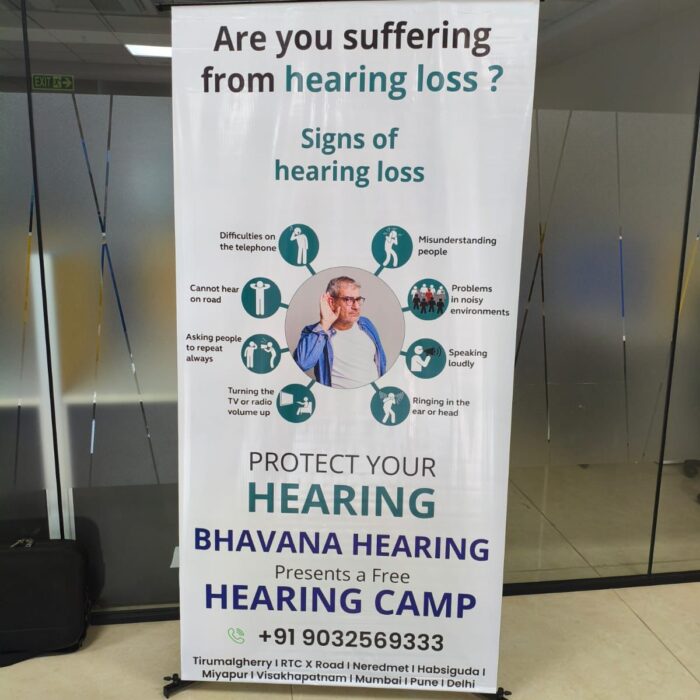 “Patient consulting an audiologist during a free hearing check-up at a hearing camp.”